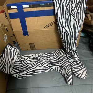 Knee high zebra boots. Size 8 worn a few times.